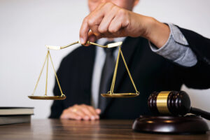 Man holding the scales of justice