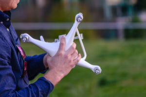 a person holding a drone