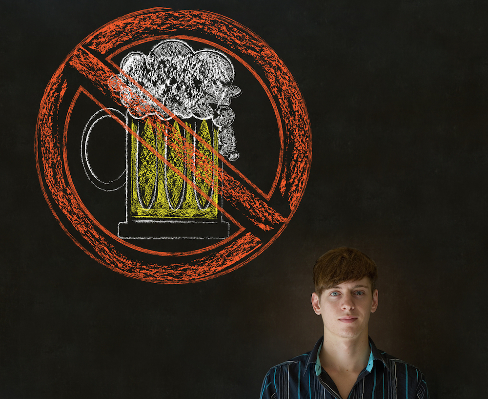 man standing in front of beer illustration