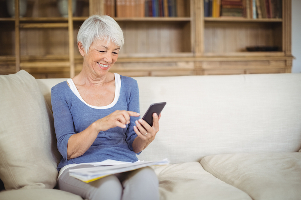 happy woman using smartphone