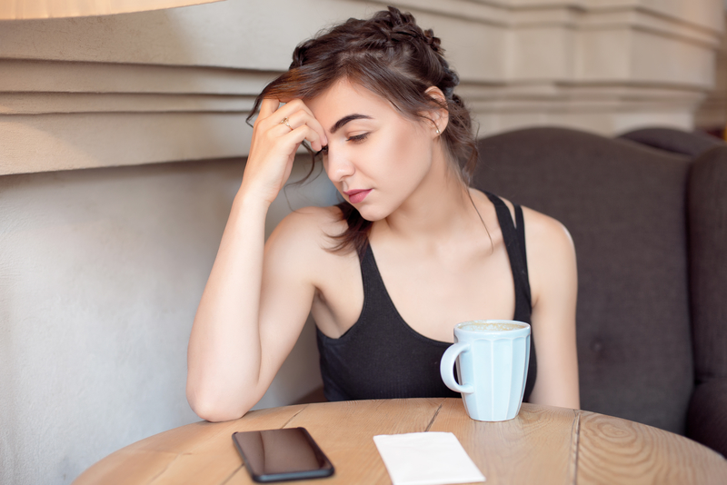 Woman sitting at table, intelligence and addiction