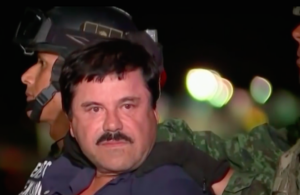 El Chapo in custody being taken to trial