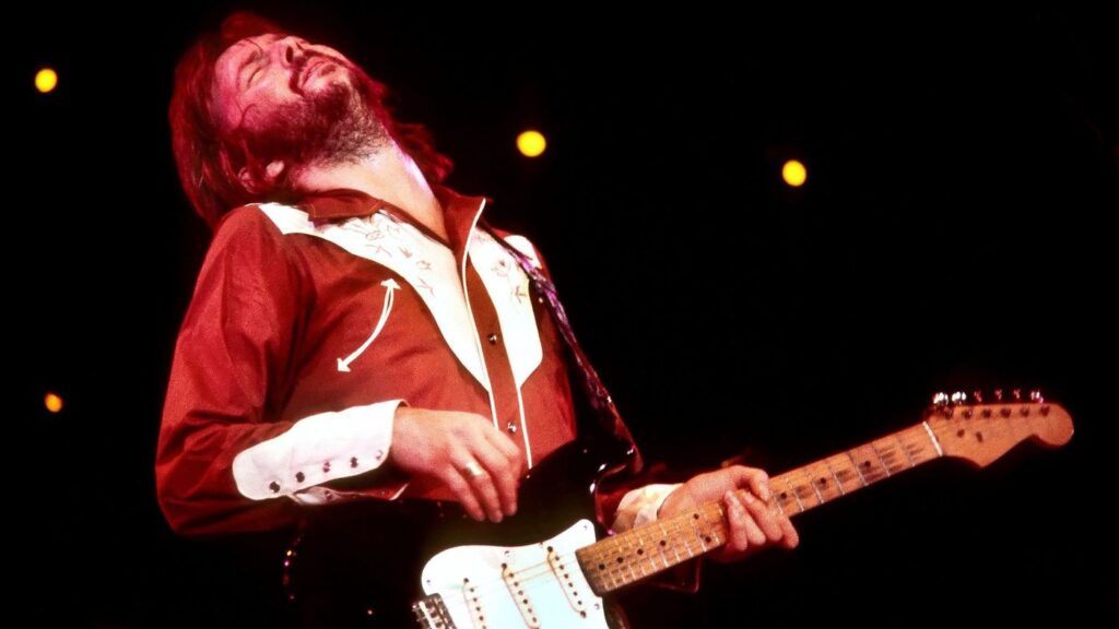 Eric Clapton with guitar in clip from "Life in 12 Bars"