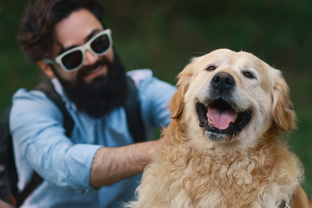 Man with depression symptoms hanging with his pet dog