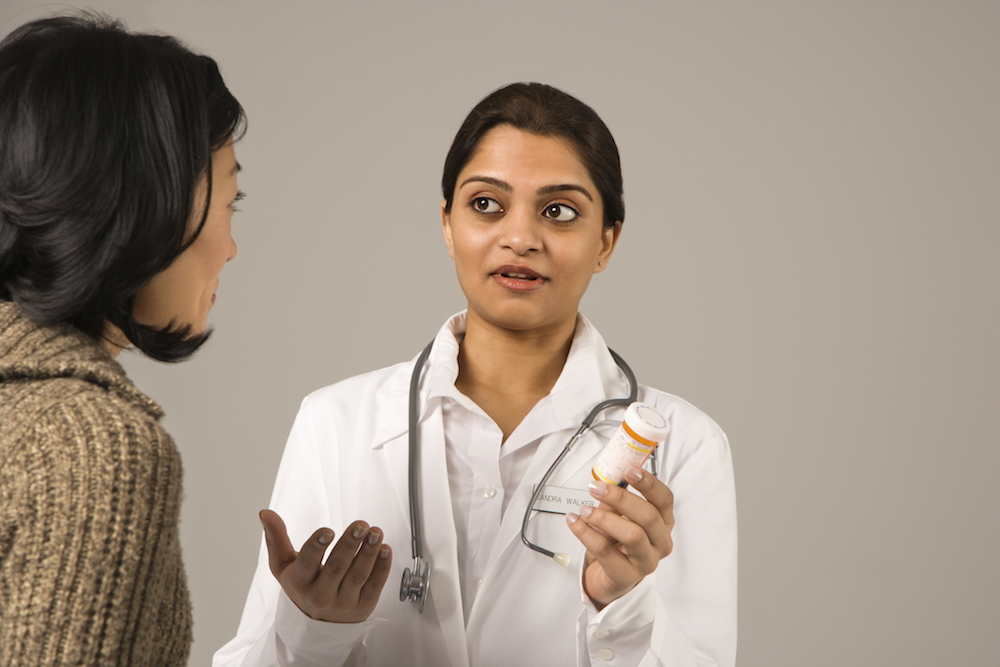 Doctor talking to patient about addiction medication