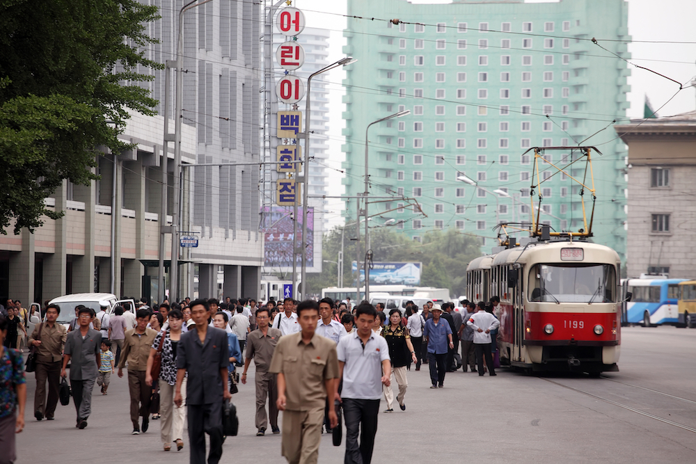 people walking in North Korea