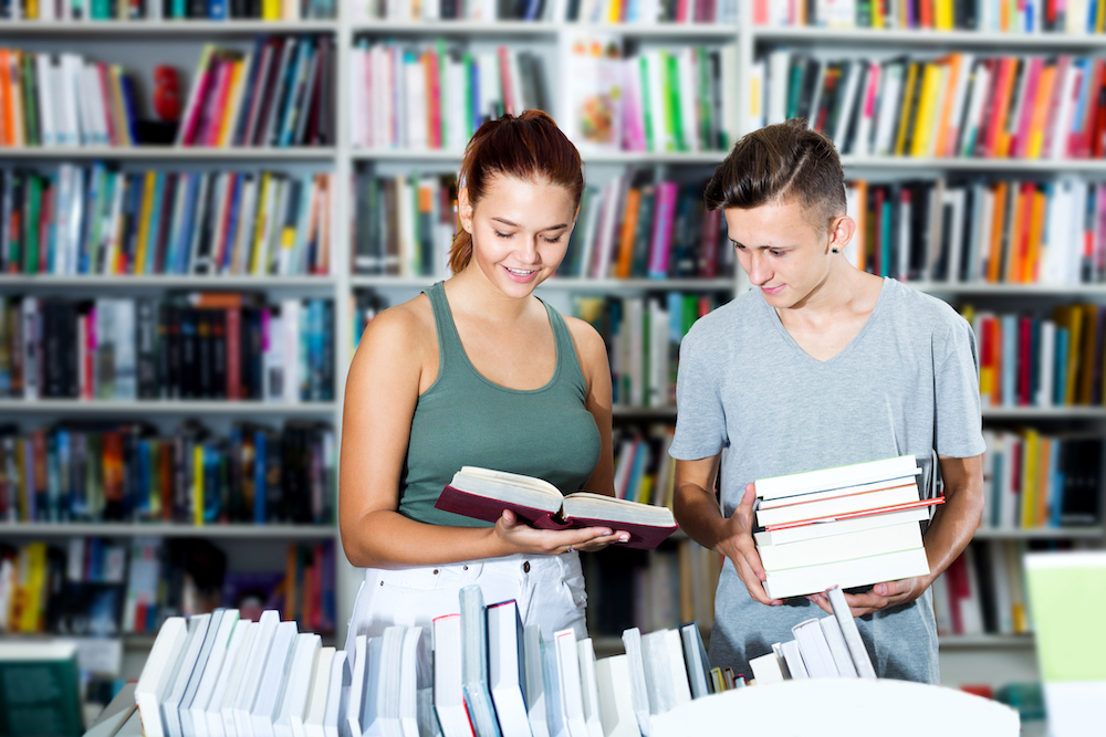 people purchasing books at Michigan company.