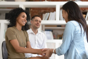 Two women and one man in mental health rehab treatment group