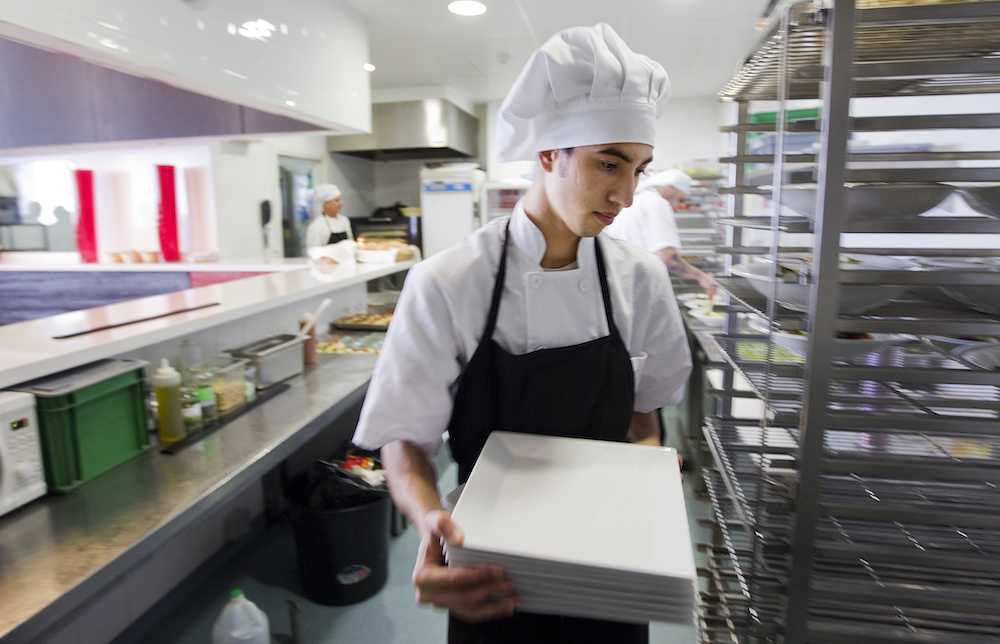hospitality worker inside of a restaurant