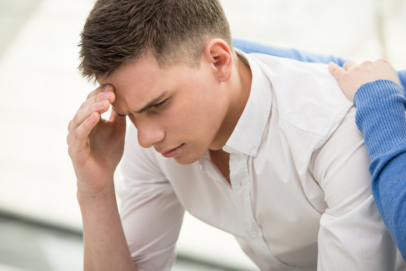 Young man receiving treatment at a teen recovery center.