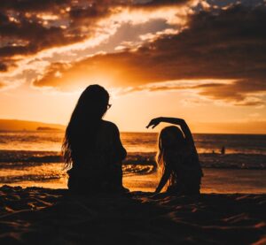 Mother and daughter at sunset, mother's day in recovery