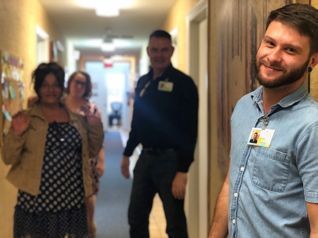 Smiling person at Inspire Recovery, a LGBTQ-specific treatment center.