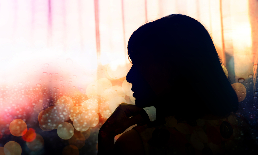 silhouette of a middle-aged woman