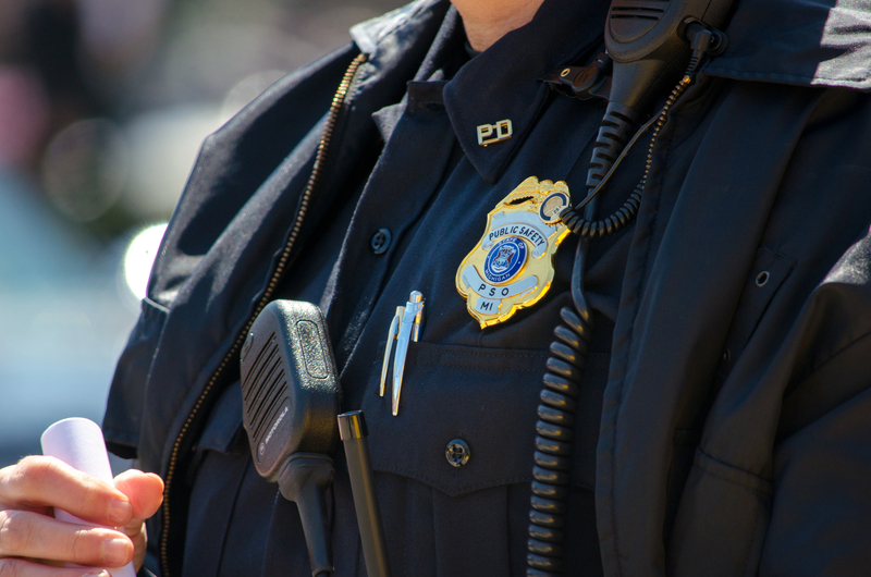 close up of a police officer in uniform