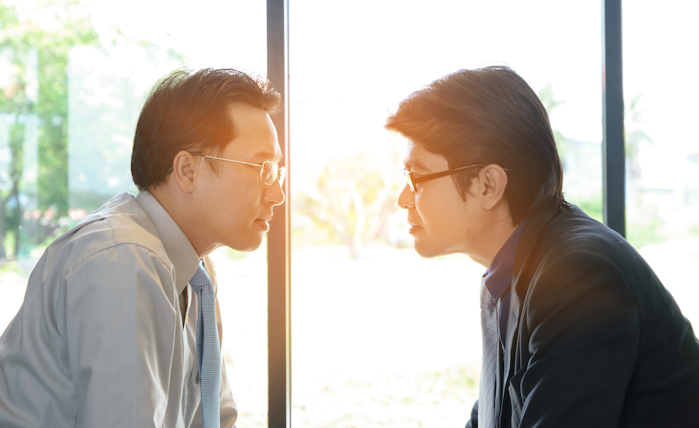 two men reading each other's faces