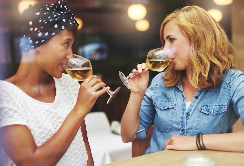 women drinking wine