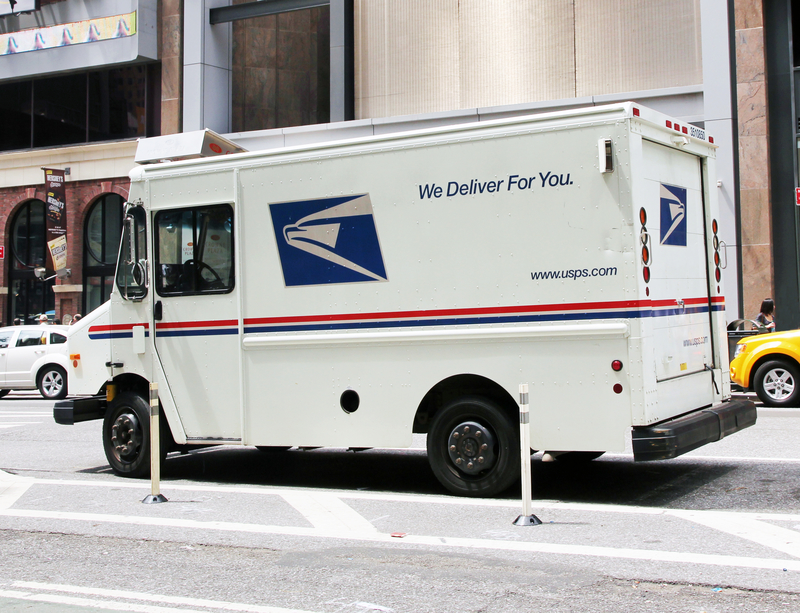 Post office vehicle transporting daily mail.