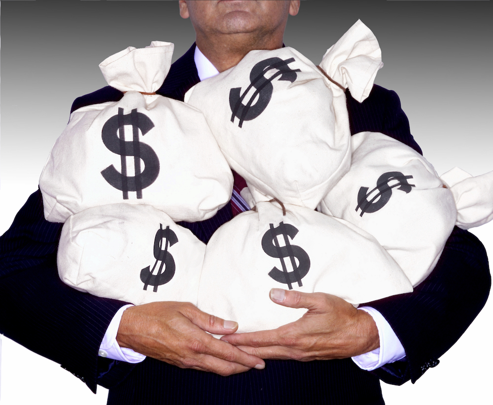 a man hoarding his wealth