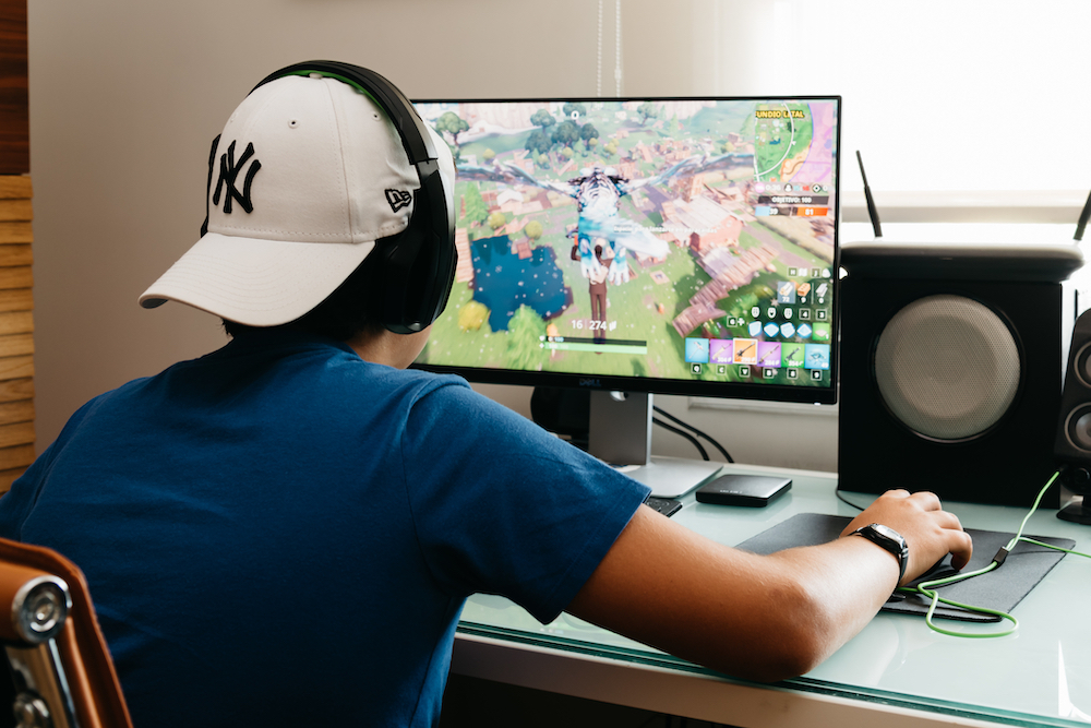 boy playing Fortnite