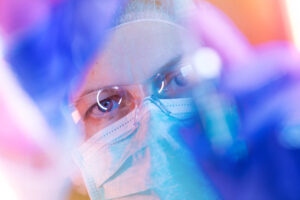 researcher looking at marijuana vape oil