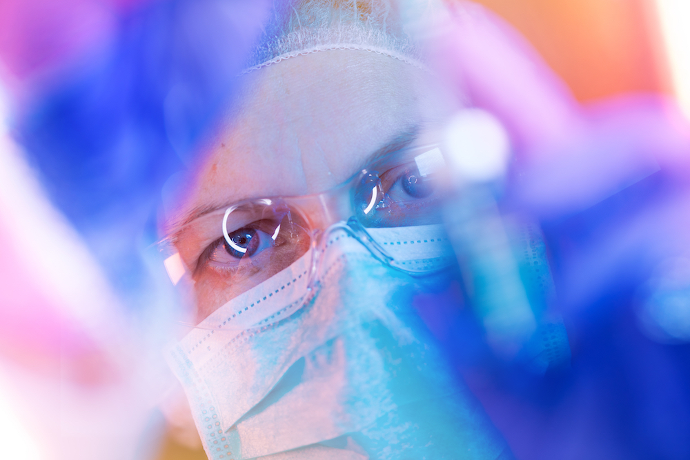 researcher looking at marijuana vape oil