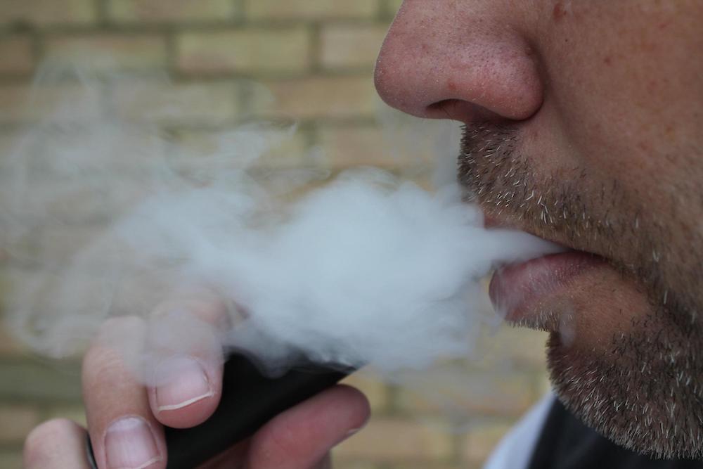 man vaping the