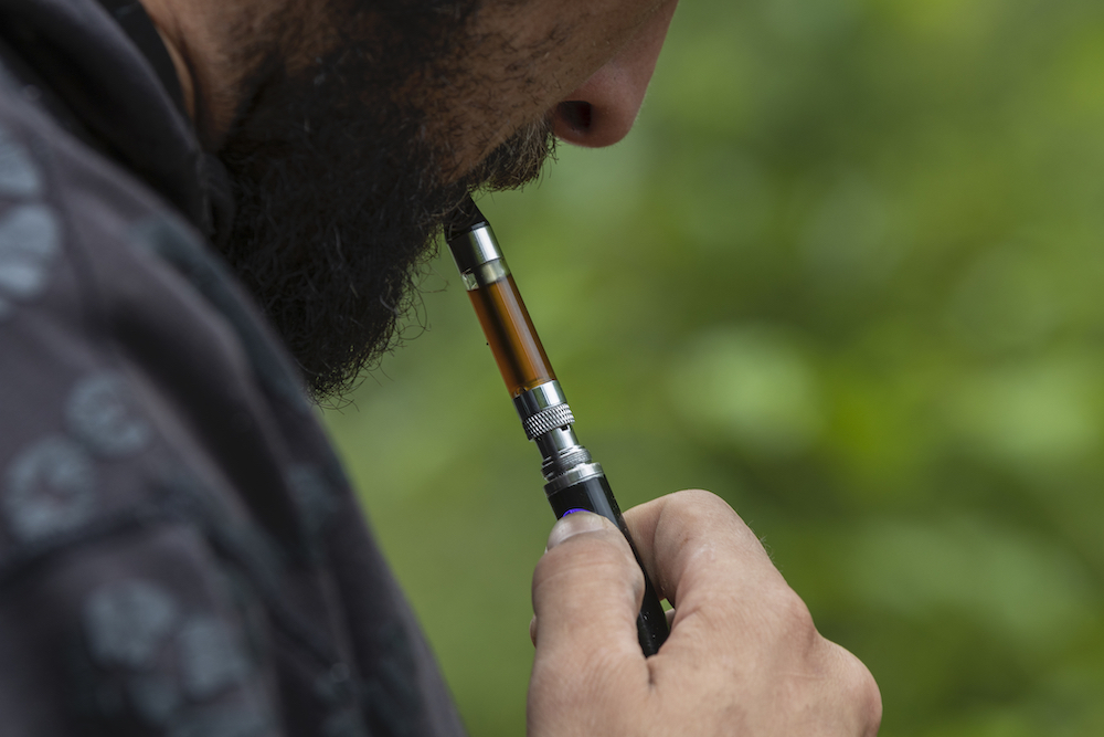 man vaping