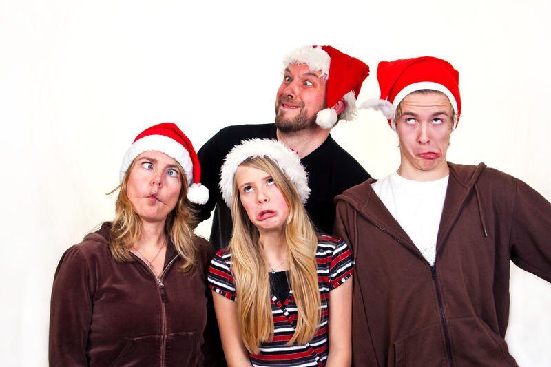 Funny-faced family Christmas portrait