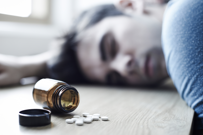 man overdosing on pills